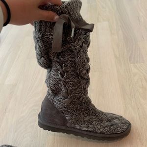 Gray lace up sweater UGG boots.